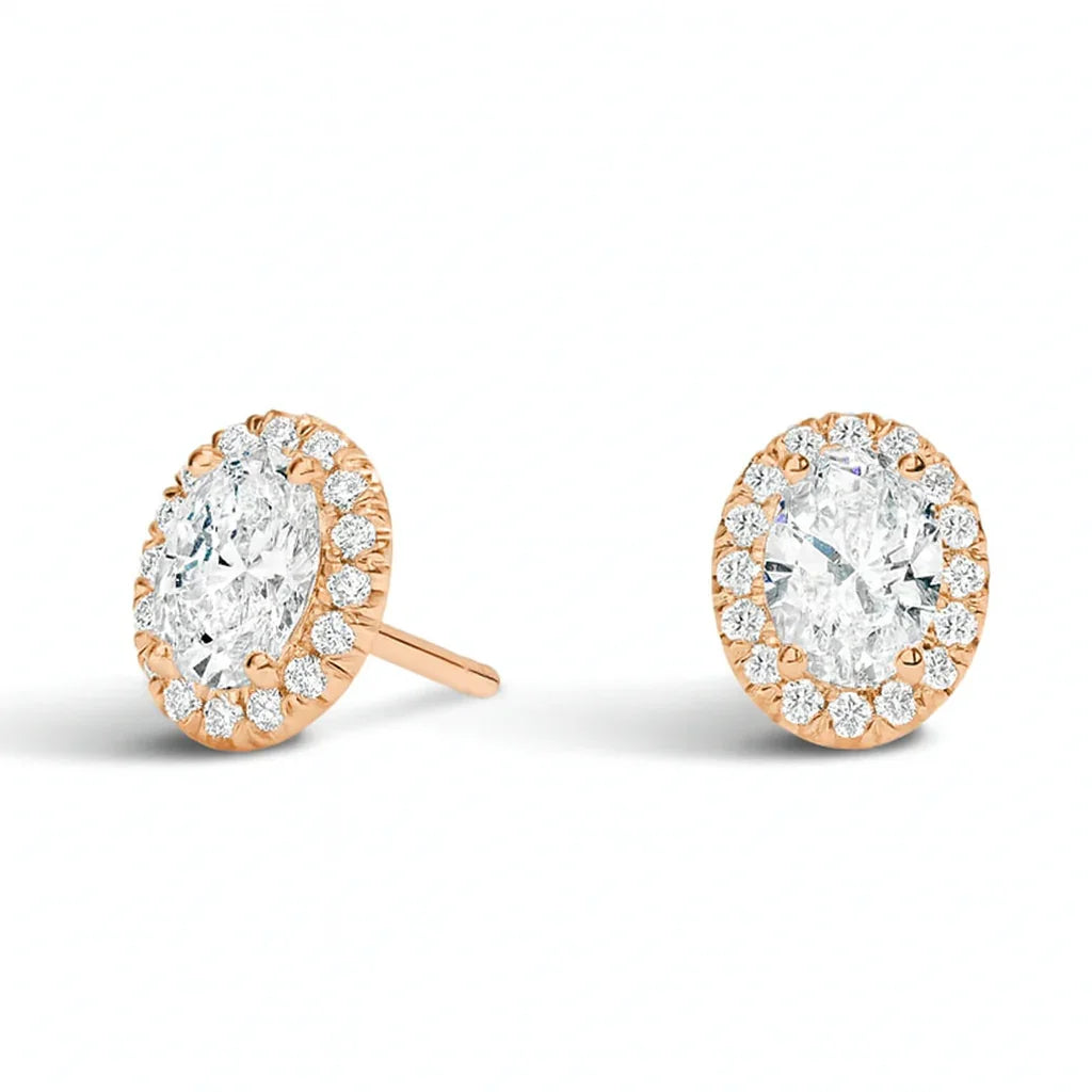 Oval lab grown diamond halo stud earrings in rose gold setting by Delux Jewelry