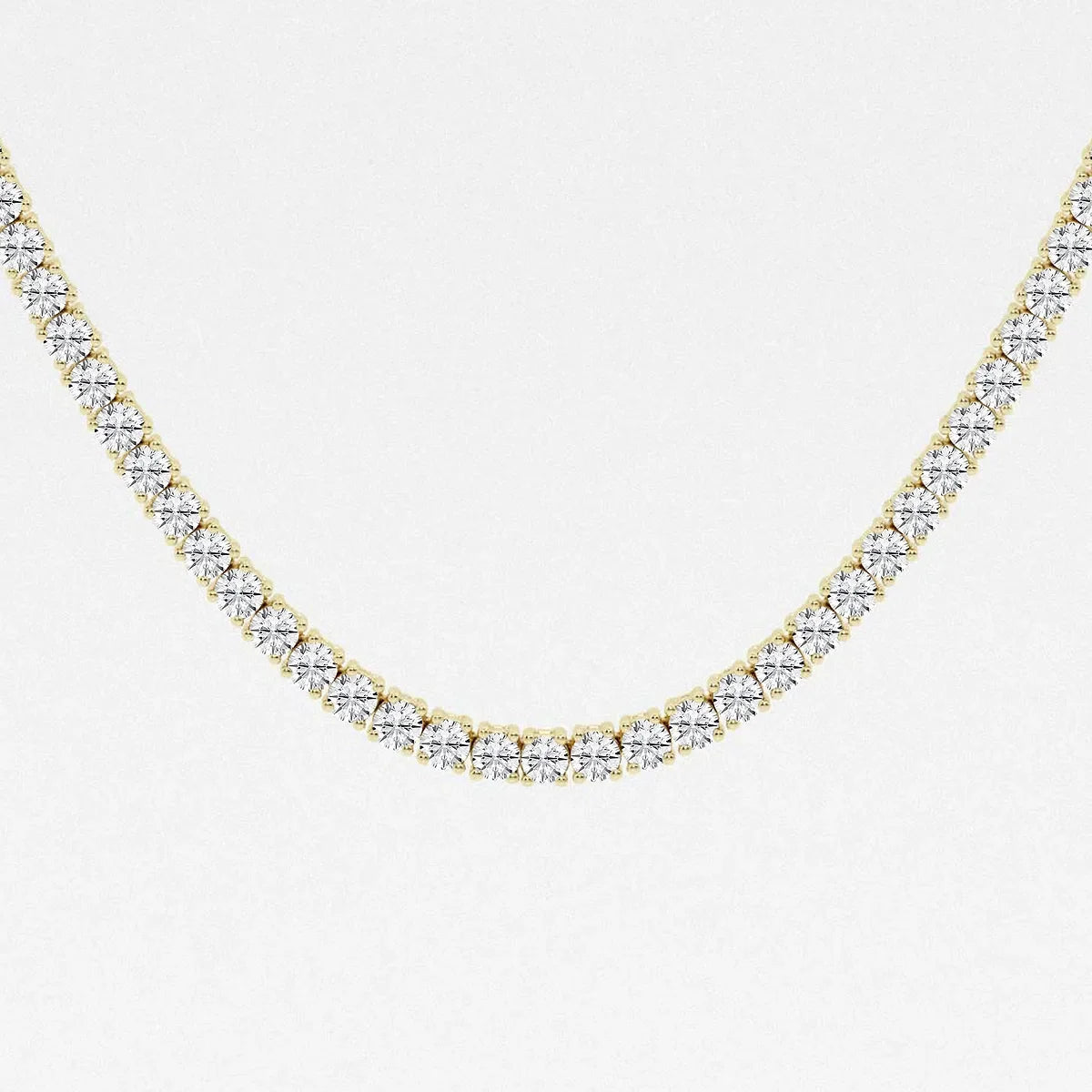 Close-up of 22 inch lab grown diamond tennis necklace in 14K yellow gold from Delux Jewelry