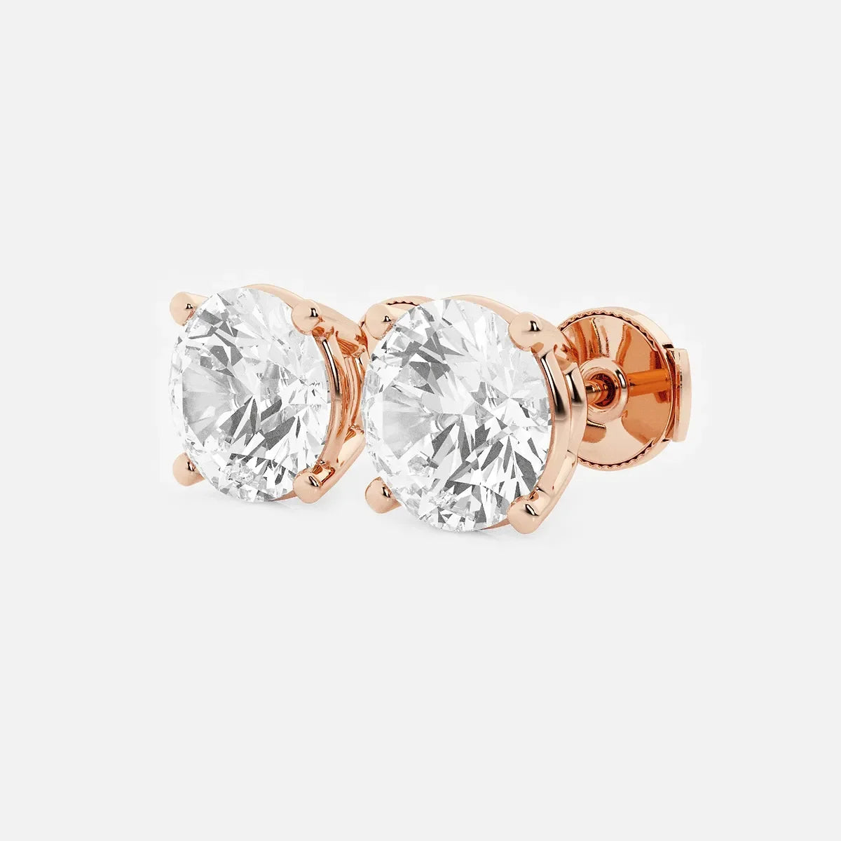 Rose gold stud earrings with round lab grown diamonds from Delux Jewelry