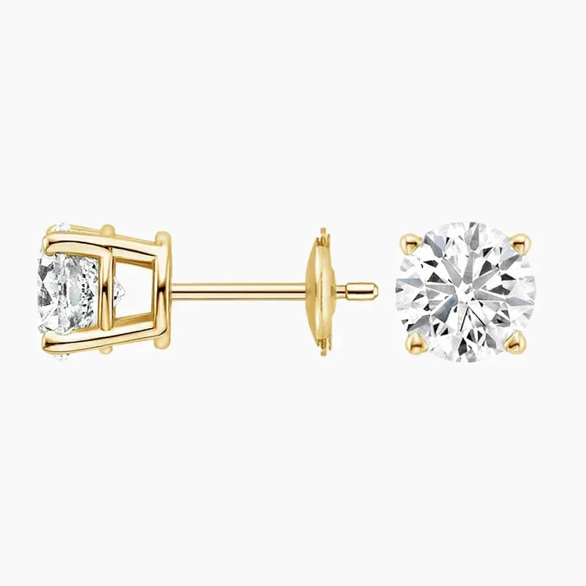 Lab grown diamond stud earrings in 14K yellow gold from Delux Jewelry on white background