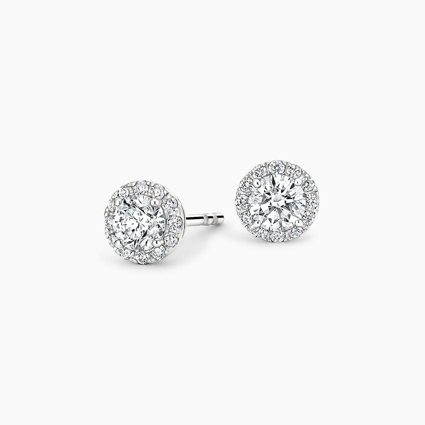 Lab grown diamond stud earrings in white gold from Delux Jewelry on white background