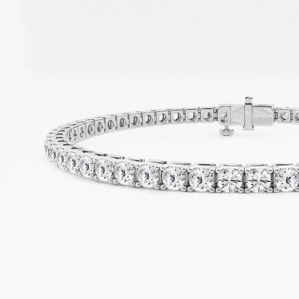 Lab grown diamond tennis bracelet in white gold by Delux Jewelry on white background