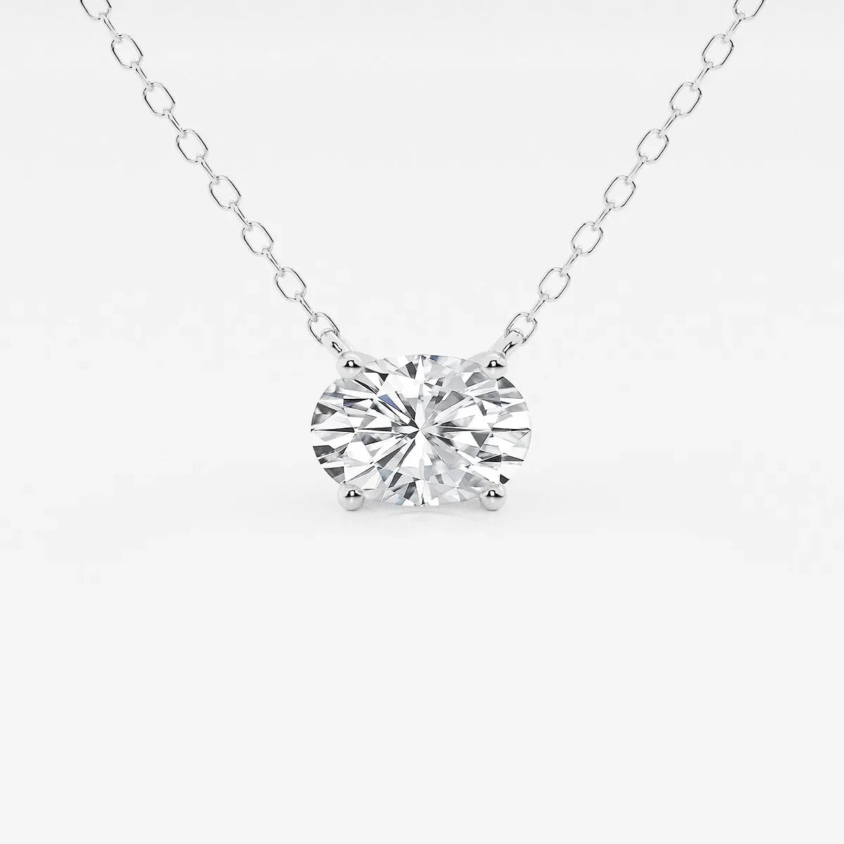 Oval lab grown diamond pendant necklace on white gold chain from Delux Jewelry