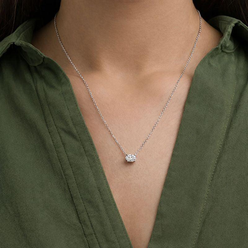 Oval lab grown diamond pendant necklace on model, Delux Jewelry, fine jewelry collection