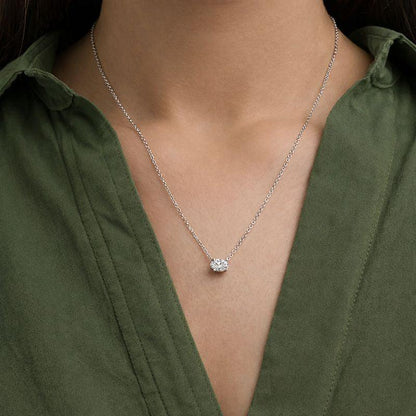 Lab grown diamond oval pendant necklace on model, Delux Jewelry, green blouse