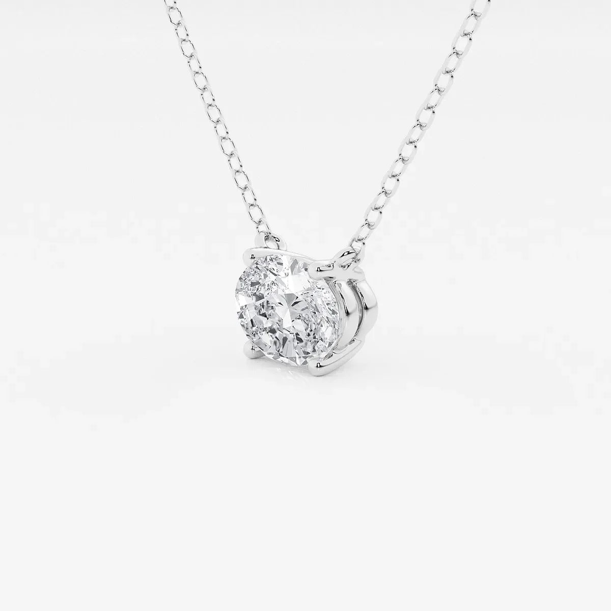 Oval lab grown diamond pendant necklace on a delicate silver chain, Delux Jewelry