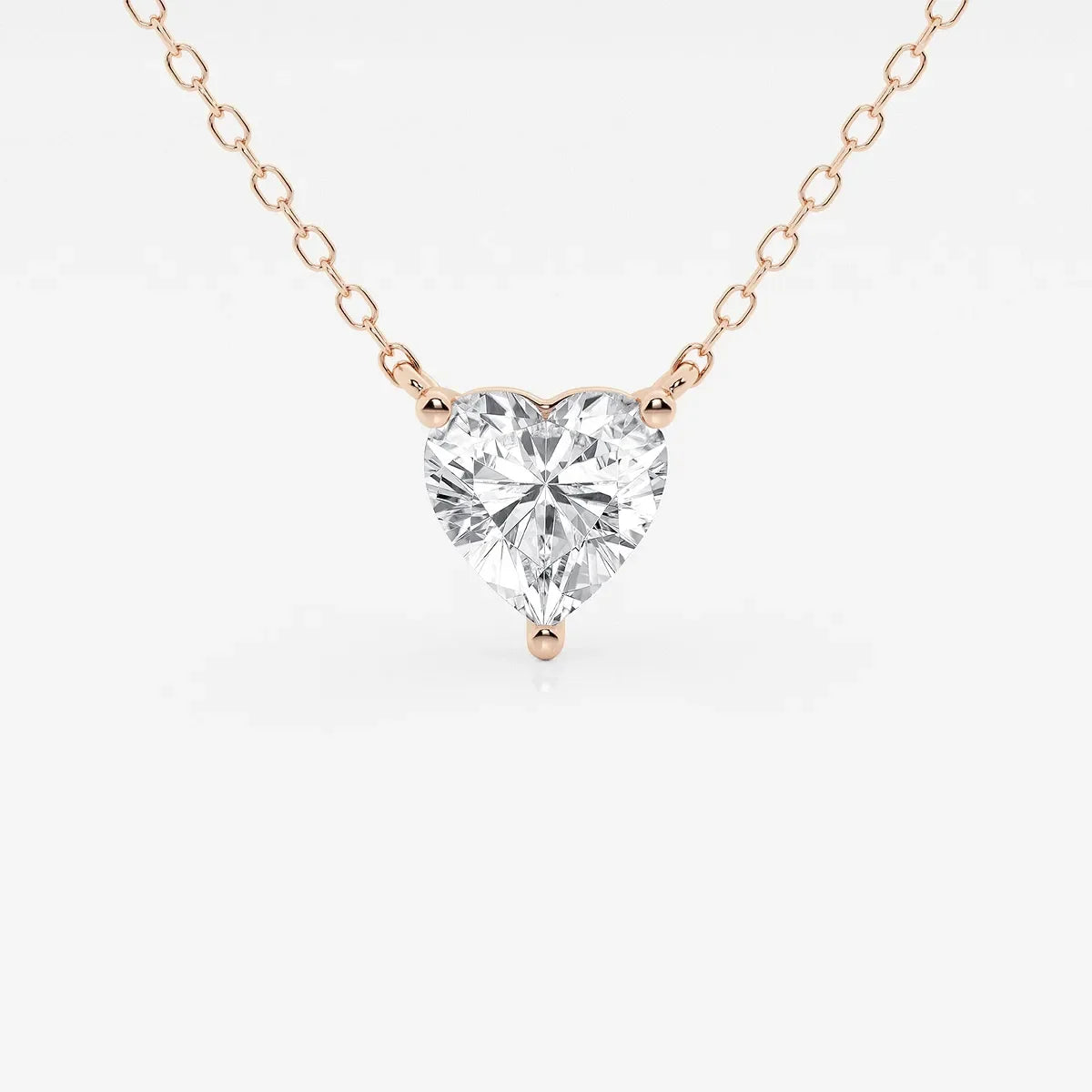 Rose gold chain necklace with heart-shaped lab grown diamond pendant from Delux Jewelry