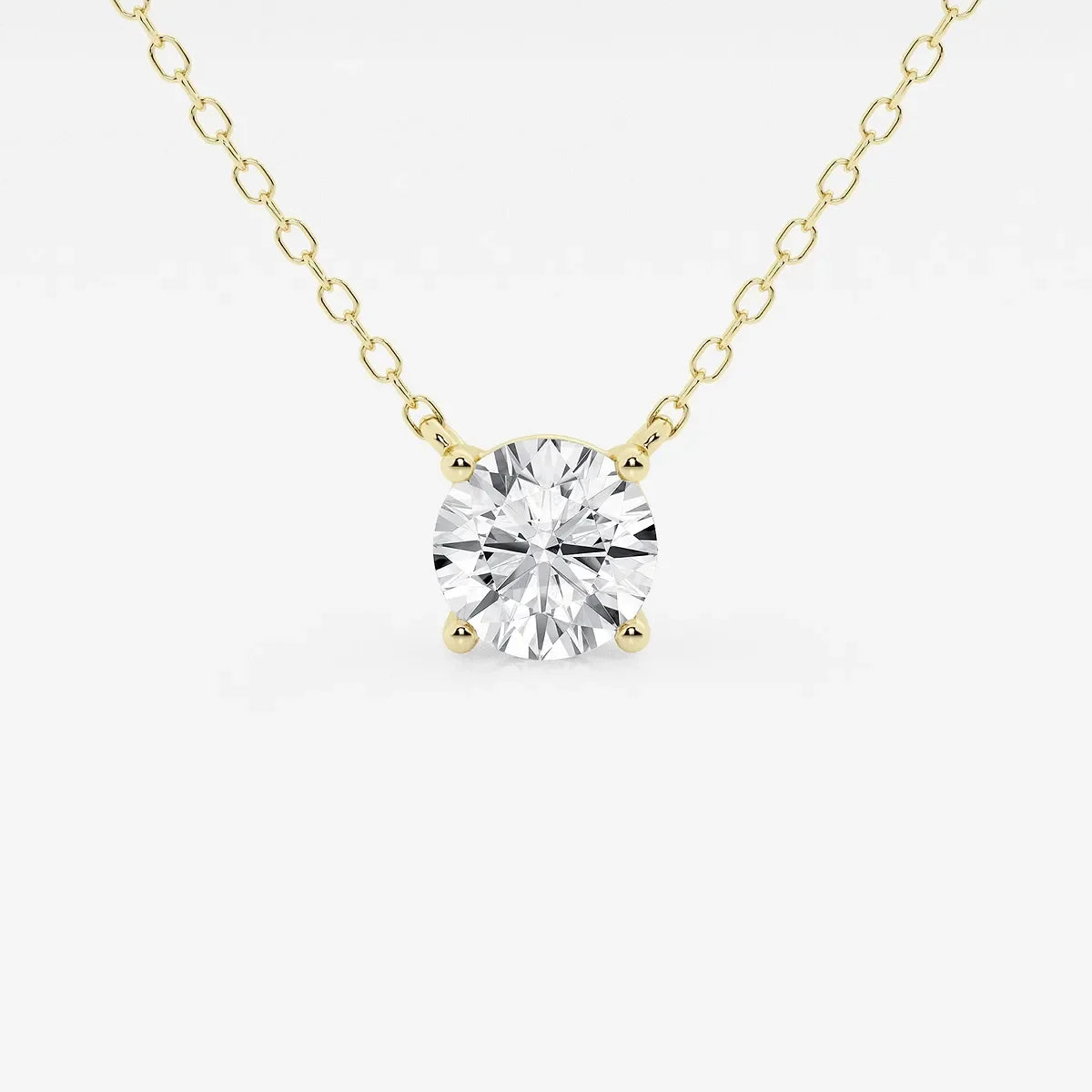 Yellow gold necklace with round lab grown diamond pendant from Delux Jewelry