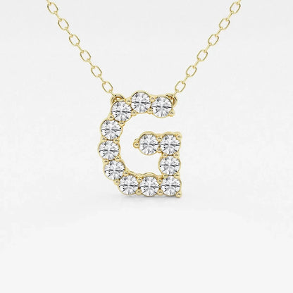 Gold necklace with lab grown diamond initial G pendant by Delux Jewelry.