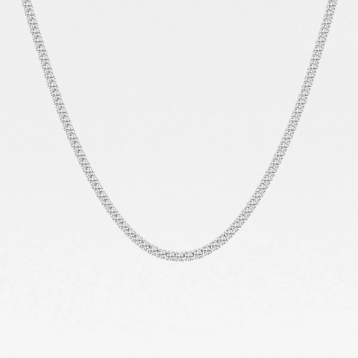 Sterling silver lab grown diamond tennis chain necklace on white background