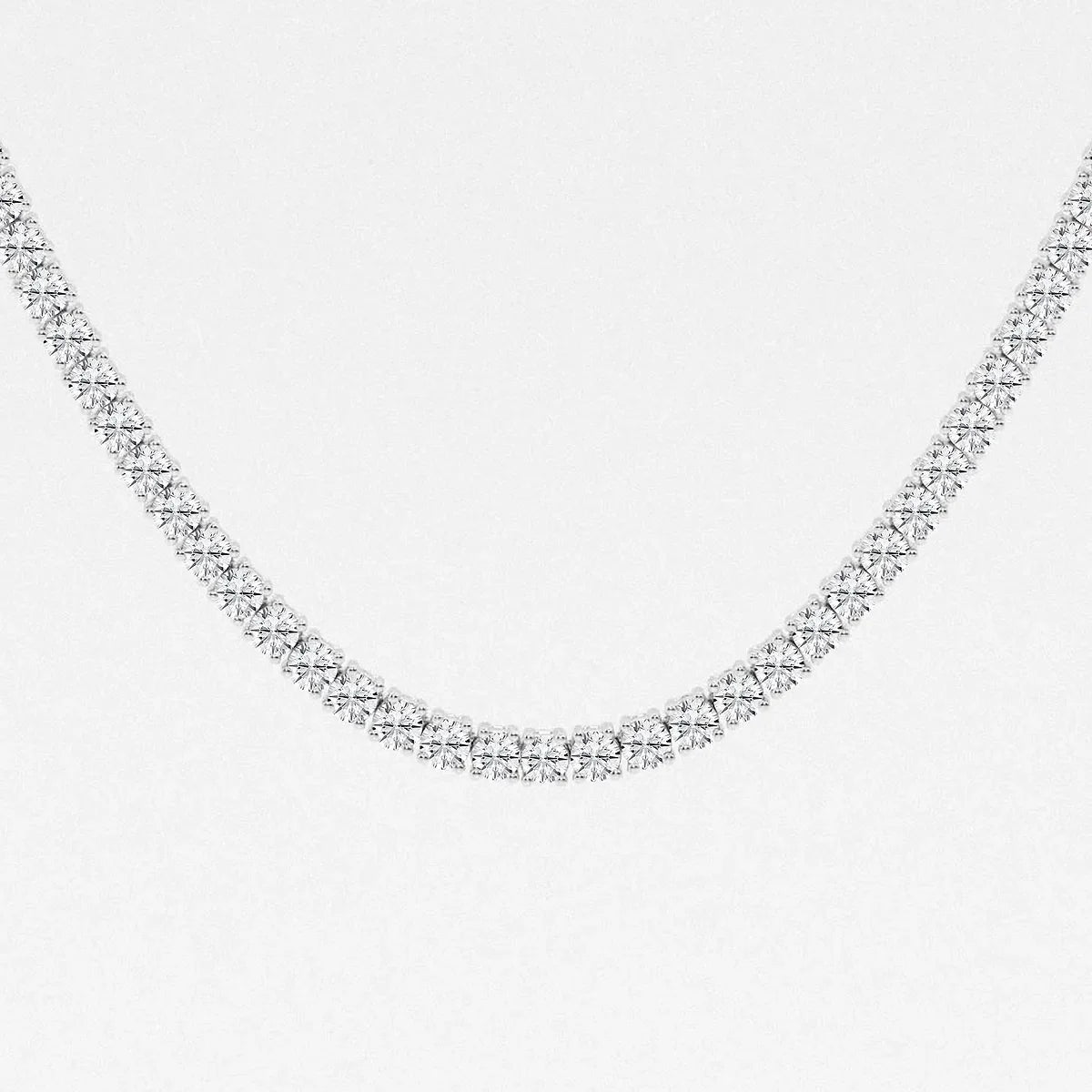 Sterling silver lab diamond tennis chain necklace on white background, Delux Jewelry