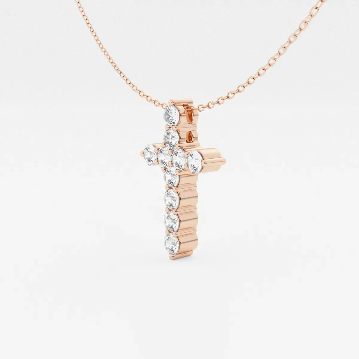 Rose gold cross pendant necklace with lab grown diamonds by Delux Jewelry on white background