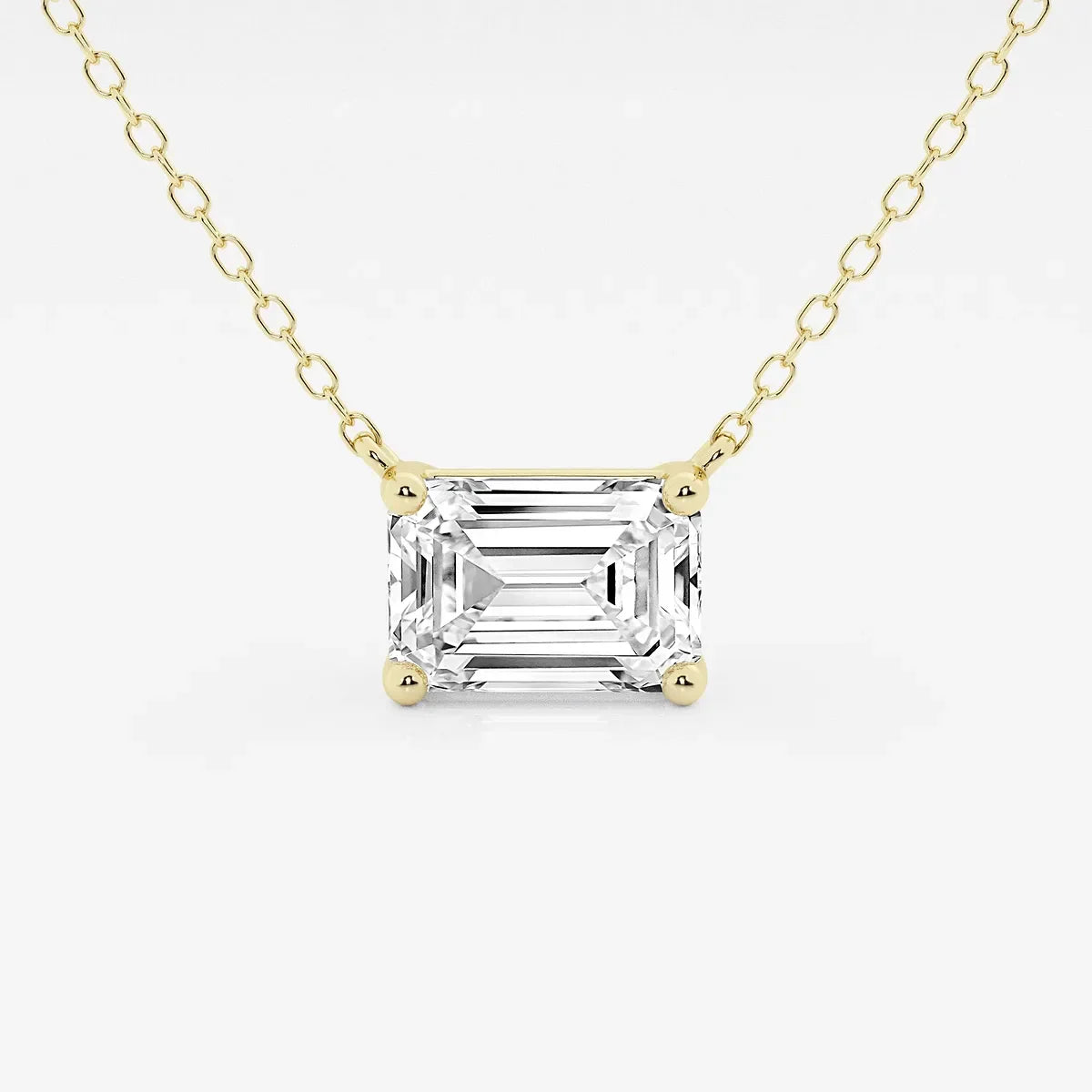 Emerald cut lab grown diamond pendant on yellow gold chain, Delux Jewelry