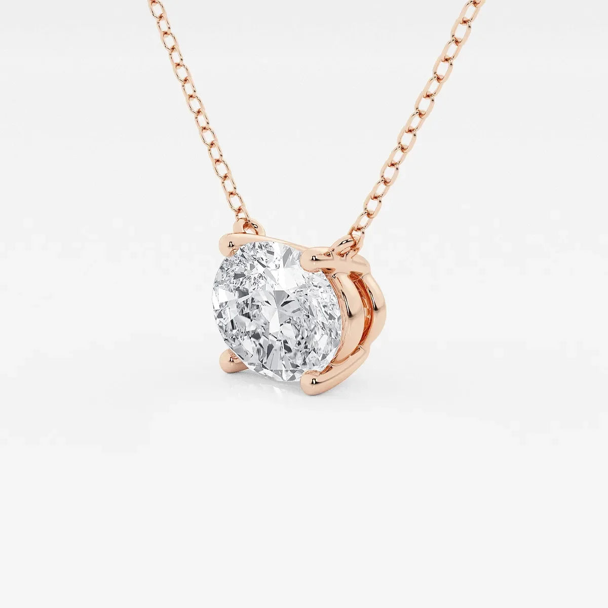 Oval lab grown diamond pendant in rose gold setting on chain, Delux Jewelry