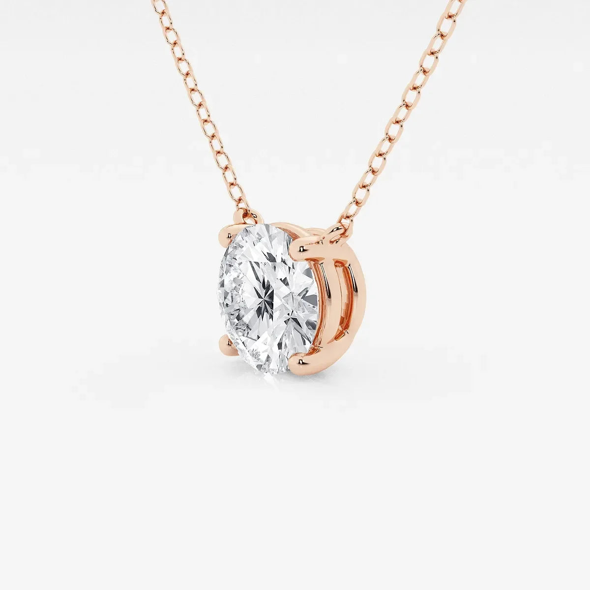 Rose gold pendant necklace with a round lab grown diamond on a delicate chain by Delux Jewelry