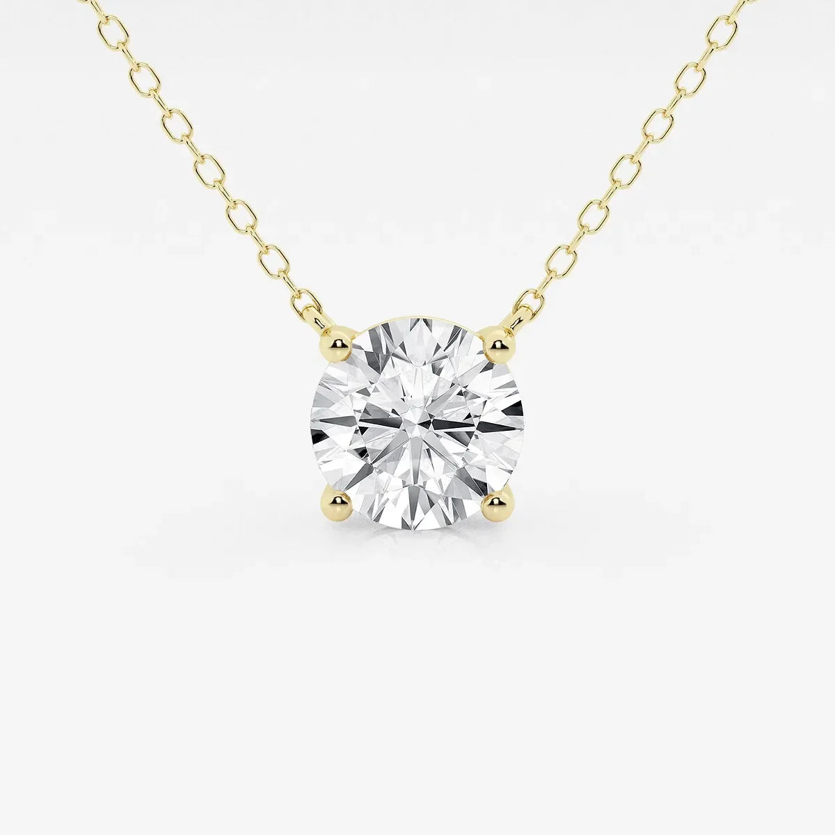 Yellow gold necklace with round lab grown diamond pendant from Delux Jewelry