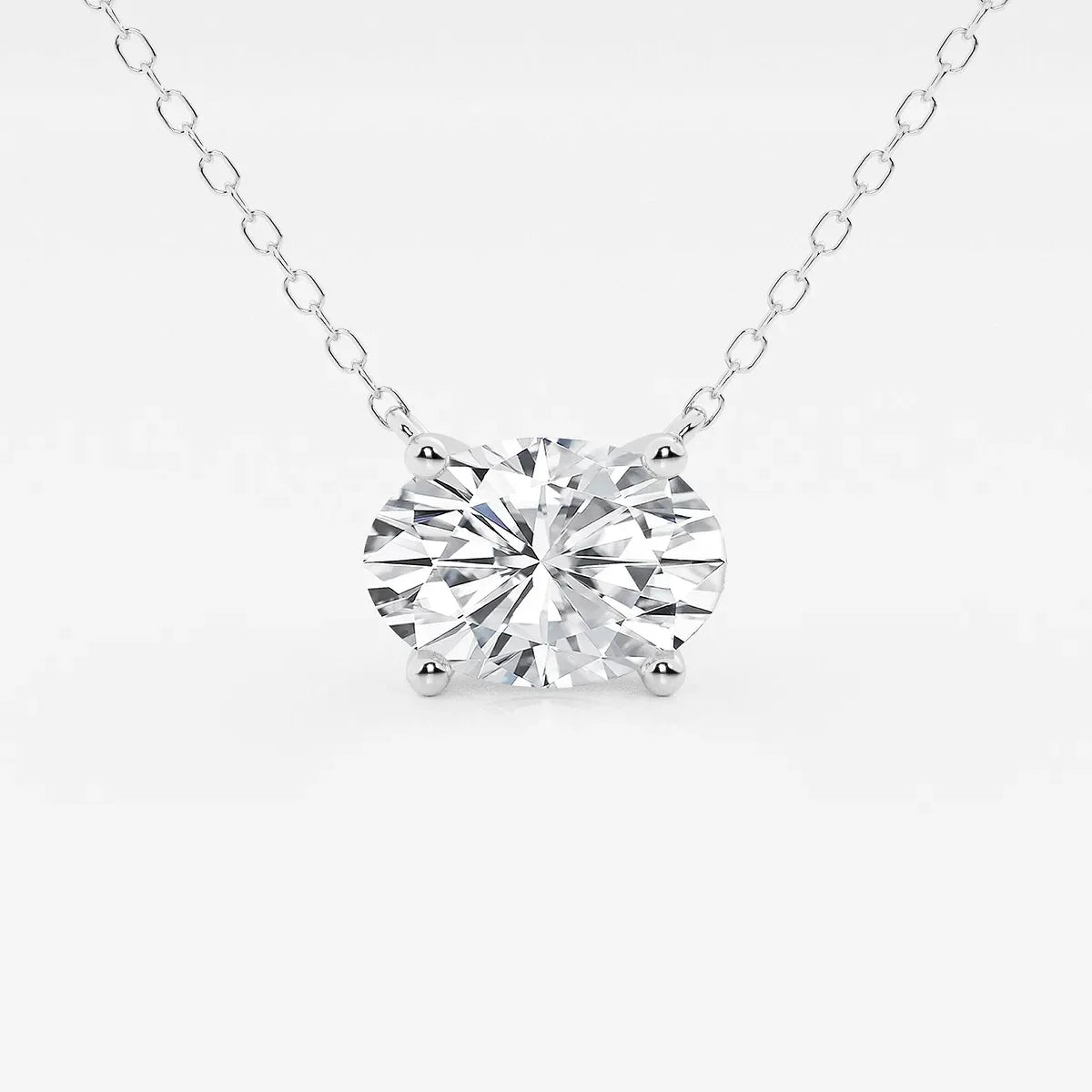 Oval lab grown diamond pendant on white gold chain from Delux Jewelry