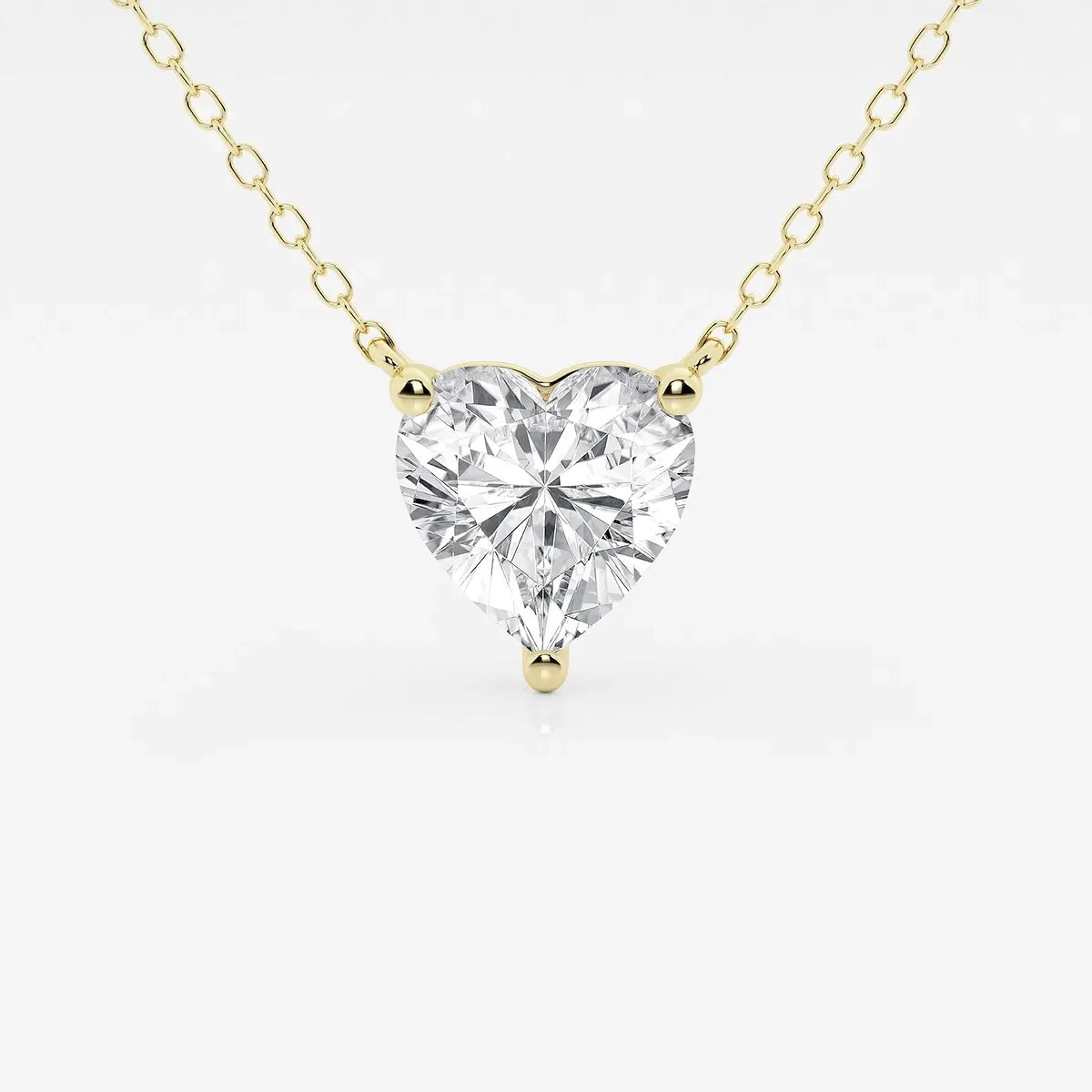 Heart-shaped lab grown diamond pendant on yellow gold chain, Delux Jewelry