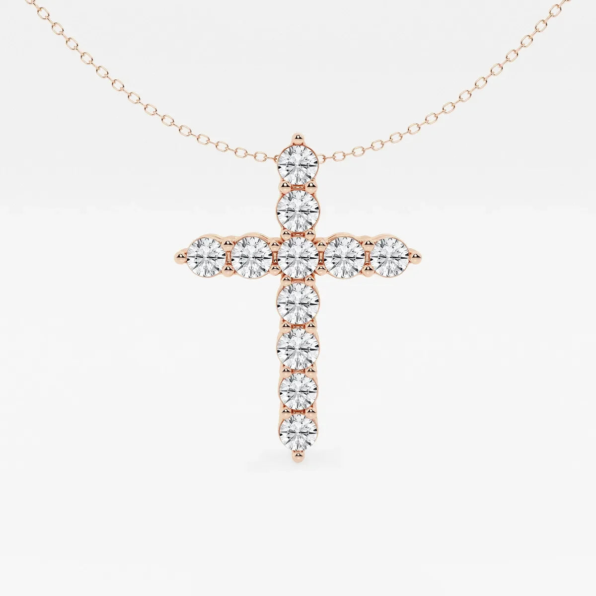 Rose gold cross pendant necklace with lab grown diamonds from Delux Jewelry on white background