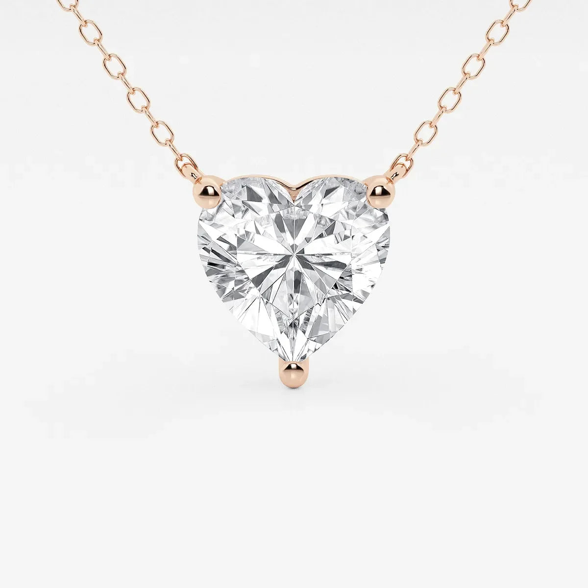 Rose gold heart pendant necklace with lab grown diamond from Delux Jewelry