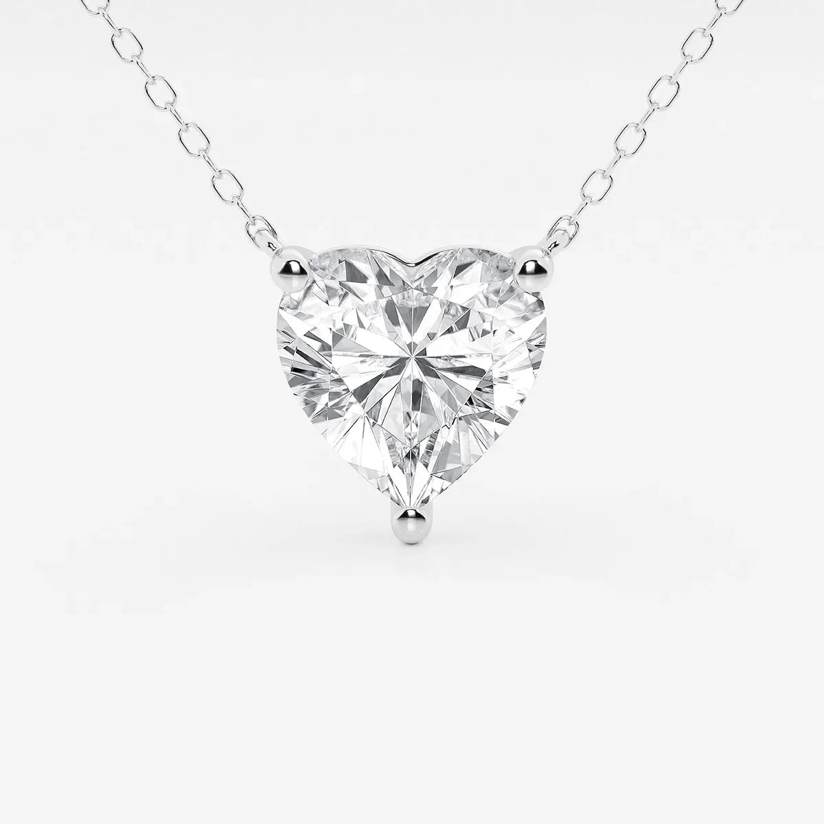 Heart-shaped lab grown diamond pendant in white gold on delicate chain, Delux Jewelry