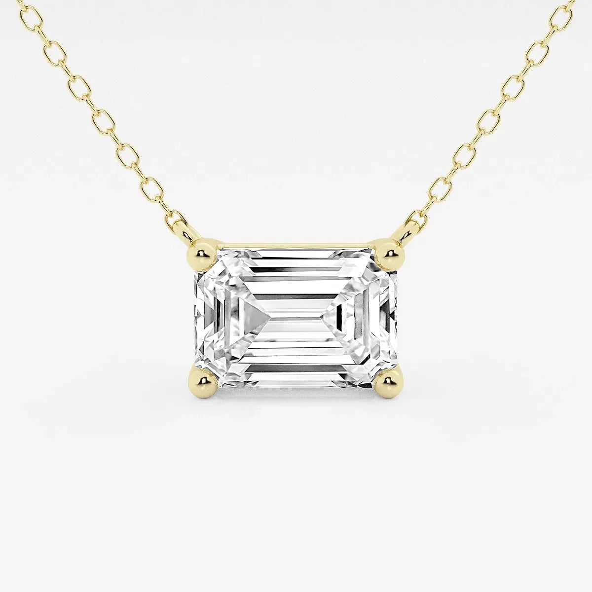 Emerald cut lab grown diamond pendant on yellow gold chain, Delux Jewelry