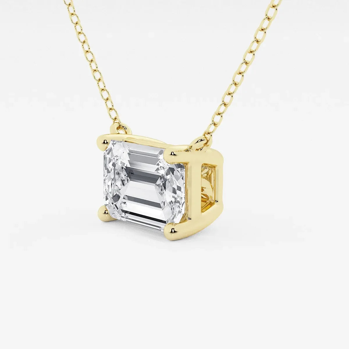 Emerald cut lab grown diamond pendant in yellow gold setting from Delux Jewelry