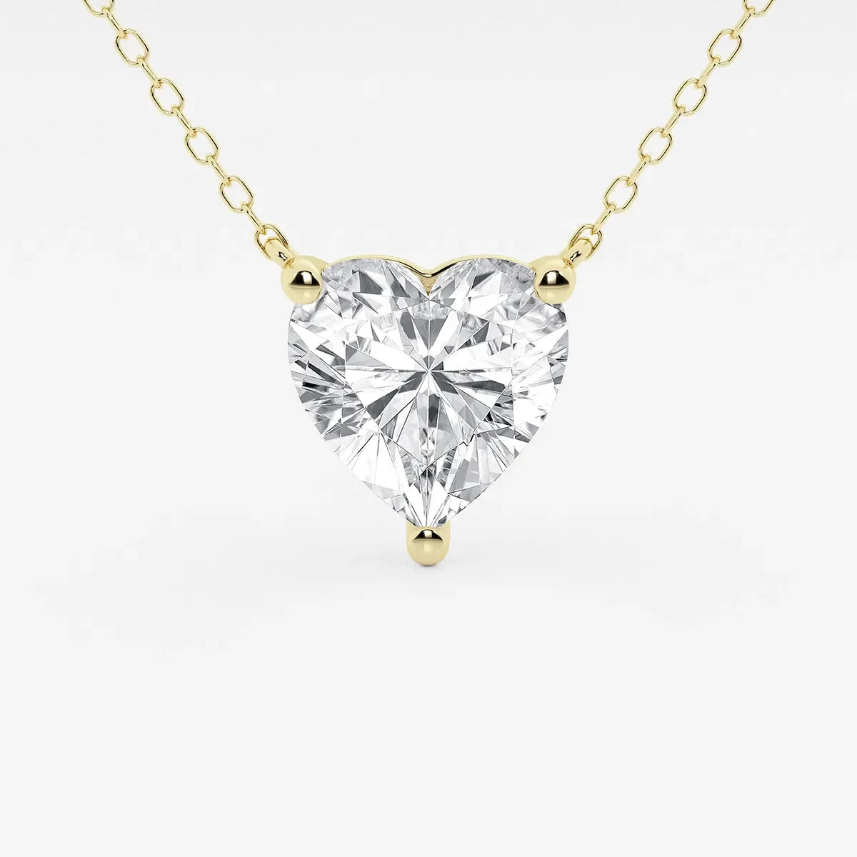 Heart-shaped lab grown diamond pendant in yellow gold chain from Delux Jewelry