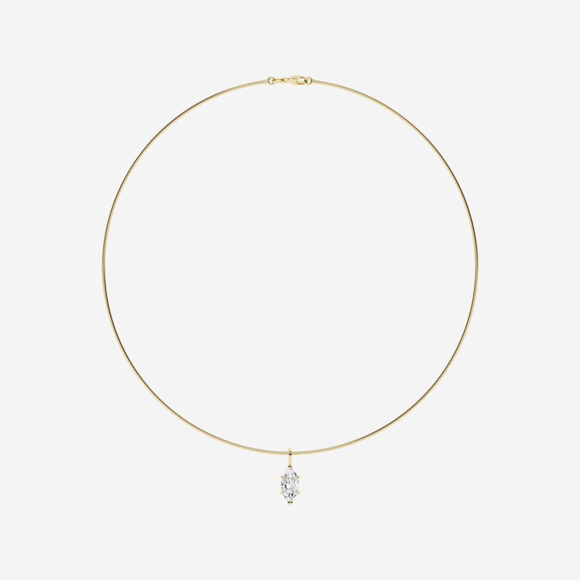 Yellow gold necklace with marquise cut lab grown diamond pendant on white background