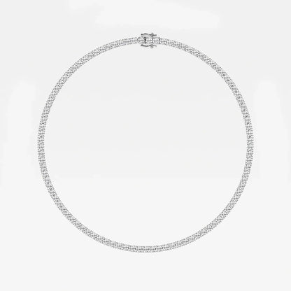 Sterling silver tennis chain necklace with lab grown diamonds on white background, Delux Jewelry