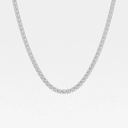 Sterling silver tennis chain necklace with lab grown diamonds on white background, Delux Jewelry