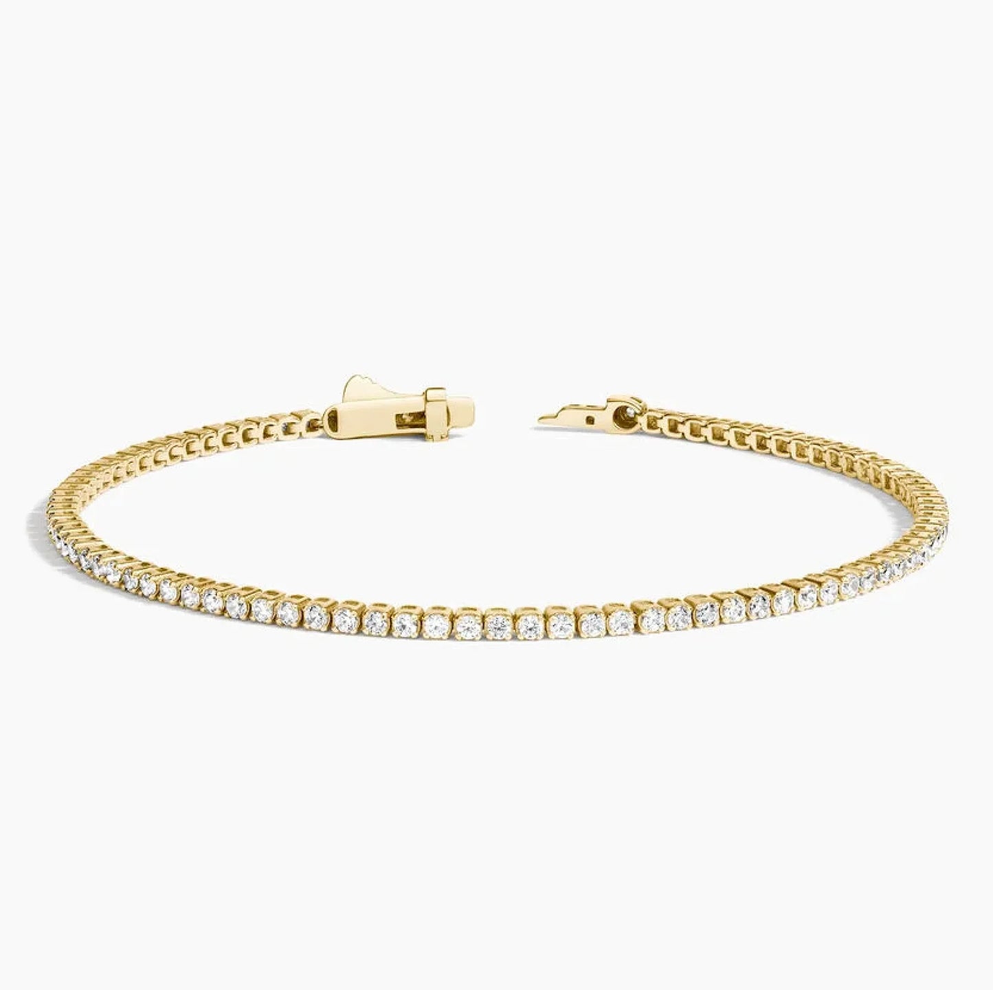 14K yellow gold lab diamond tennis bracelet with open clasp on white background, Delux Jewelry