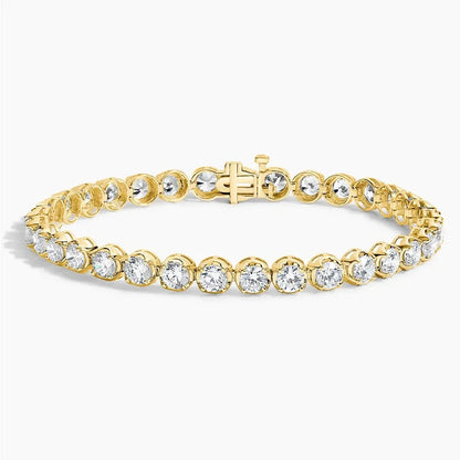 Lab grown diamond tennis bracelet in 14K yellow gold from Delux Jewelry, sparkling round stones