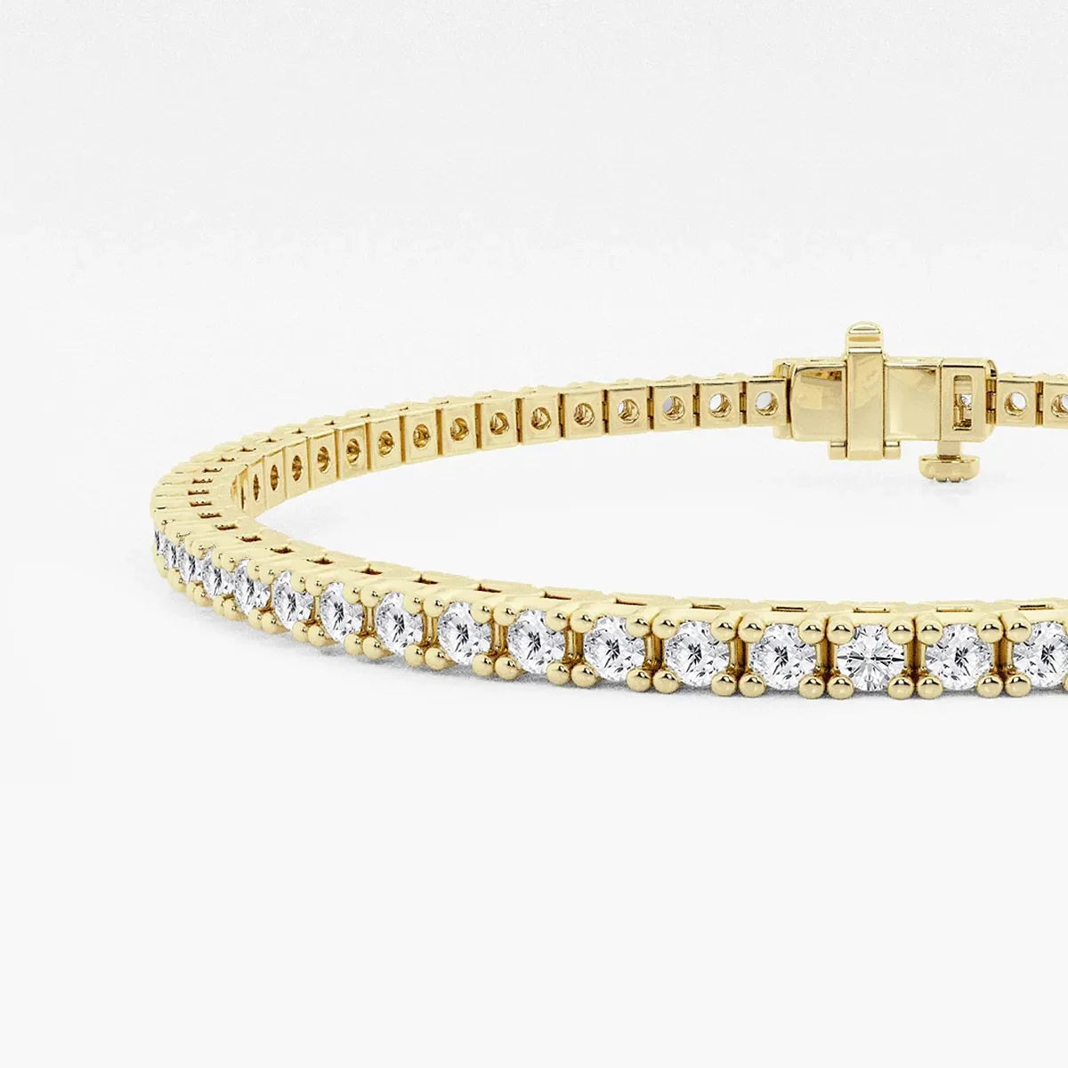 Yellow gold tennis bracelet with lab grown diamonds from Delux Jewelry on white background