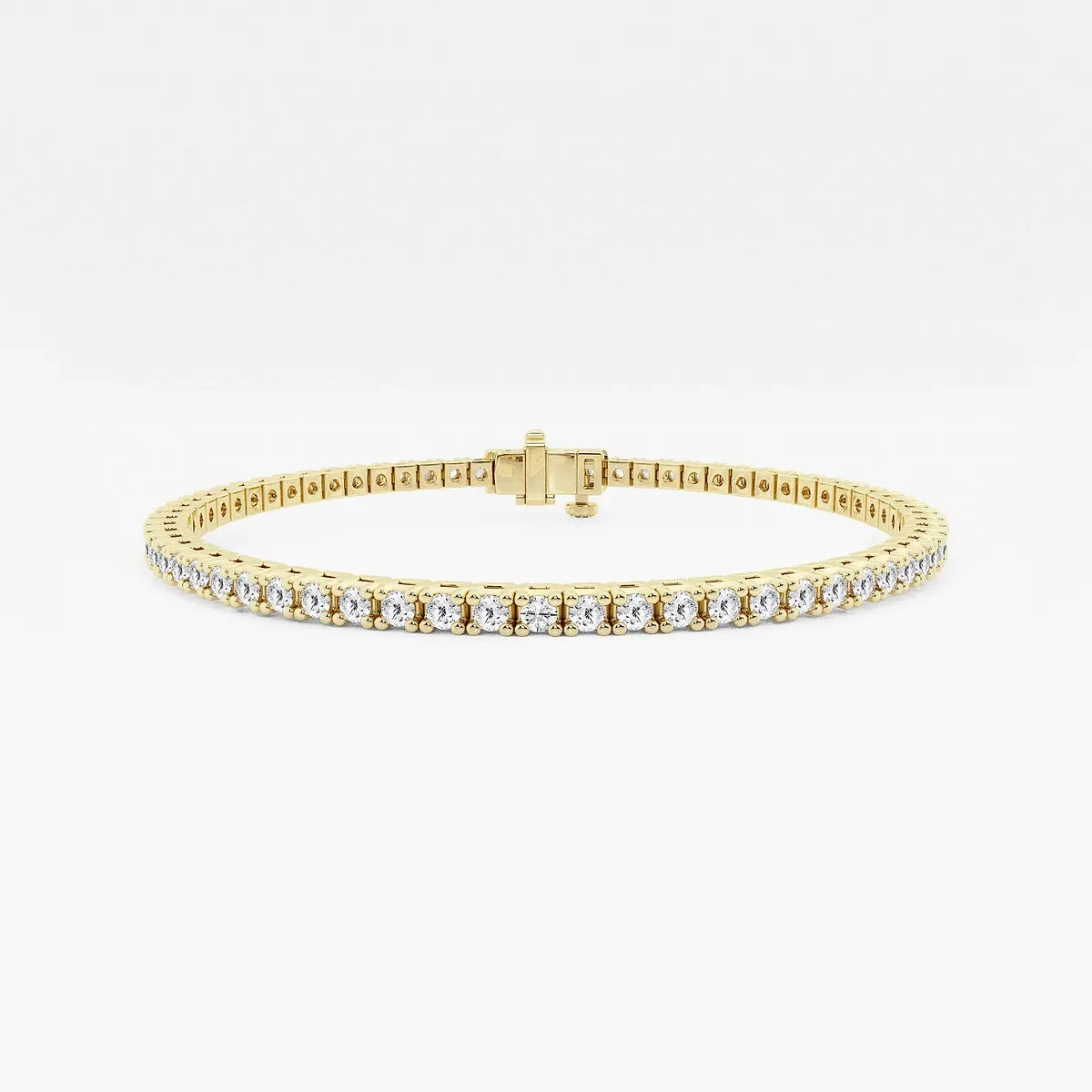 Yellow gold tennis bracelet with lab grown diamonds by Delux Jewelry on white background