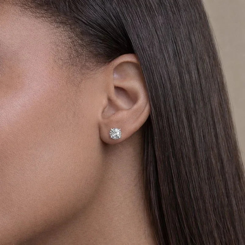 Woman wearing Delux Jewelry lab grown diamond stud earring close-up