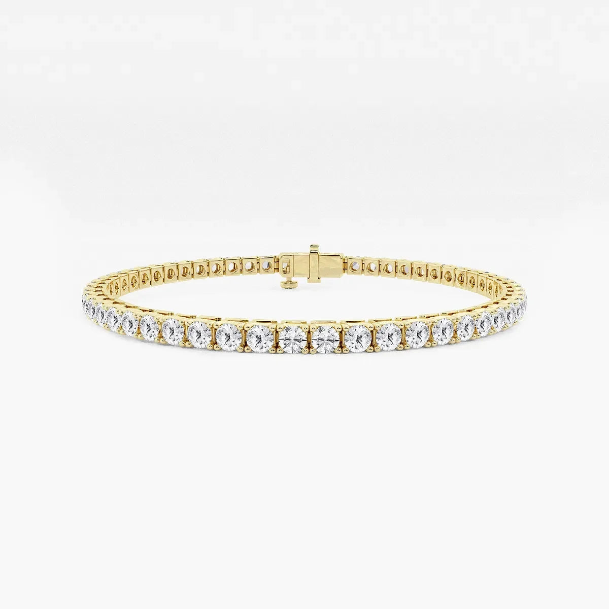 Yellow gold lab grown diamond tennis bracelet on white background, Delux Jewelry