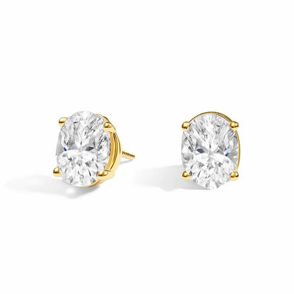 Lab grown diamond stud earrings in yellow gold setting from Delux Jewelry on white background