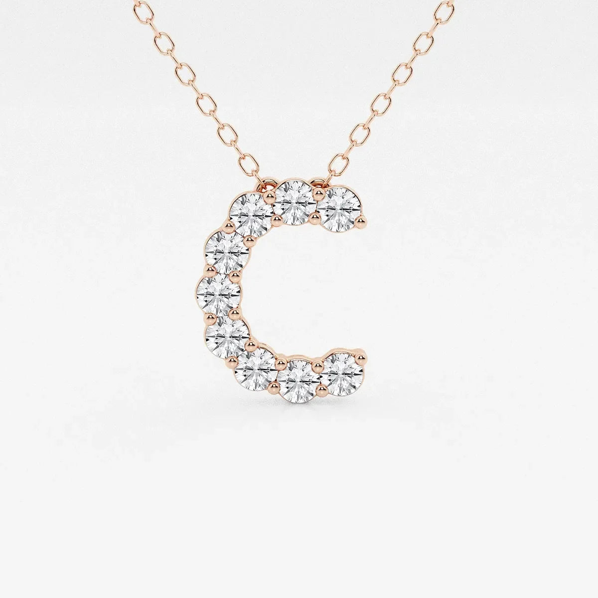Rose gold C pendant necklace with lab grown diamonds from Delux Jewelry on white background