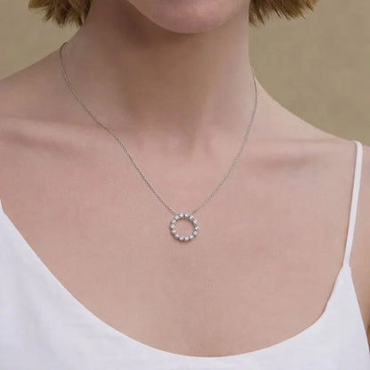 Woman wearing lab grown diamond circle pendant necklace by Delux Jewelry