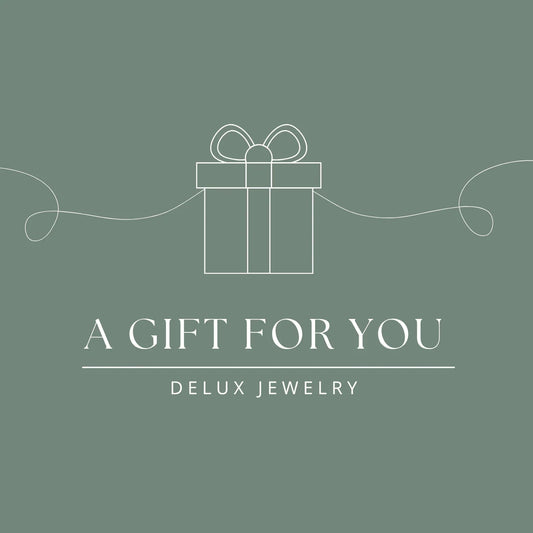 Delux Jewelry gift card with outlined gift box, elegant green background, and text 'A Gift For You'.