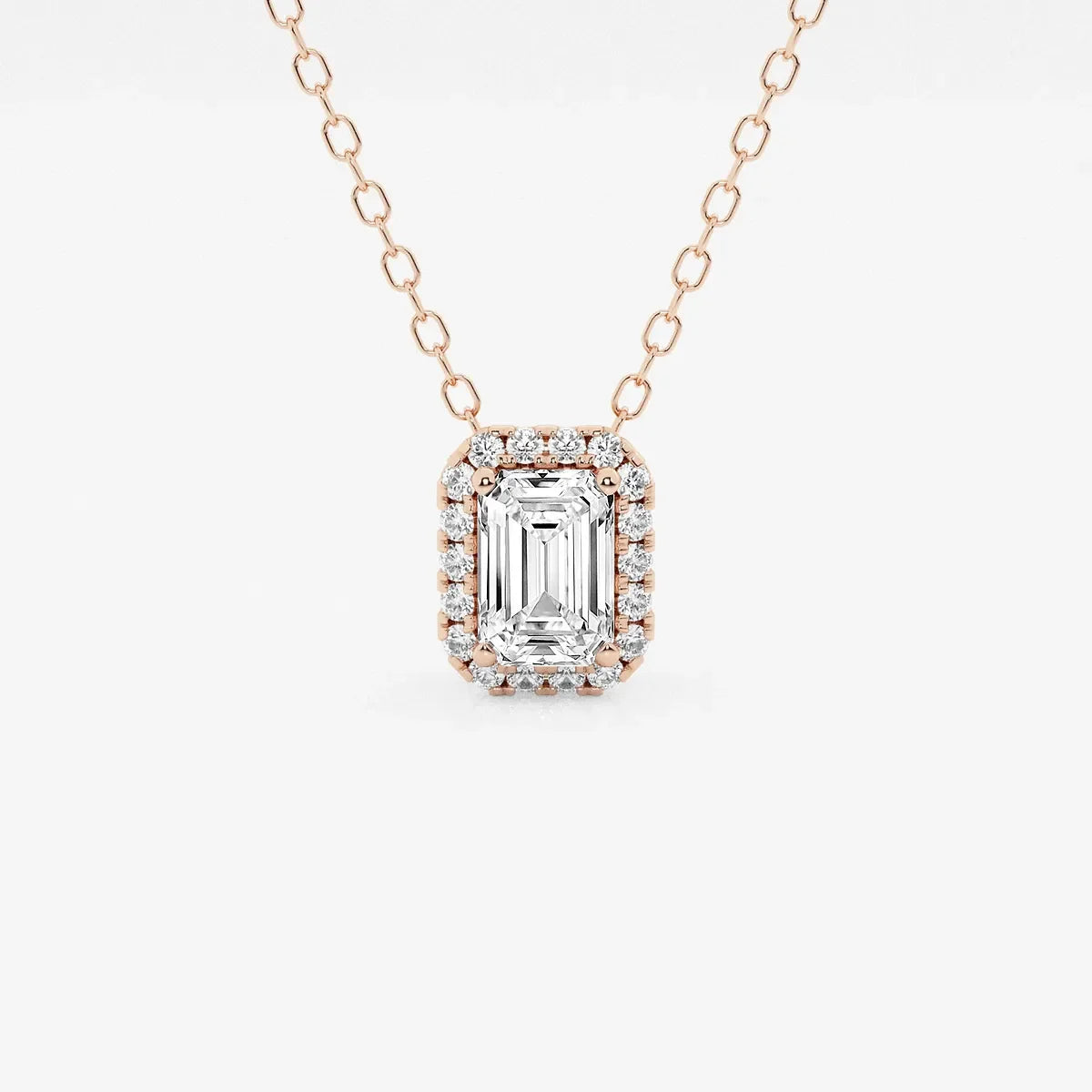 Emerald cut lab grown diamond halo pendant in rose gold on Delux Jewelry chain