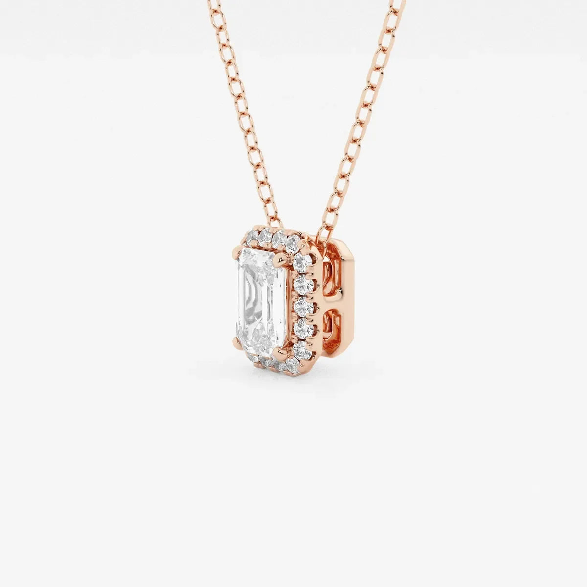 Rose gold lab grown diamond emerald halo pendant necklace from Delux Jewelry