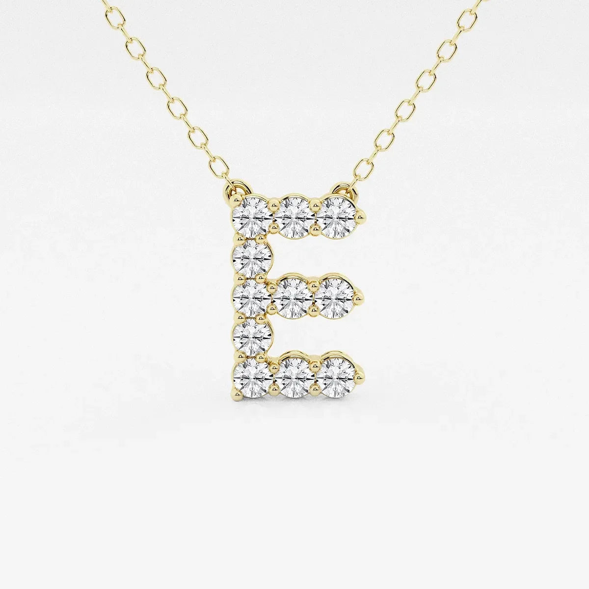 Yellow gold necklace with lab grown diamond E initial pendant from Delux Jewelry