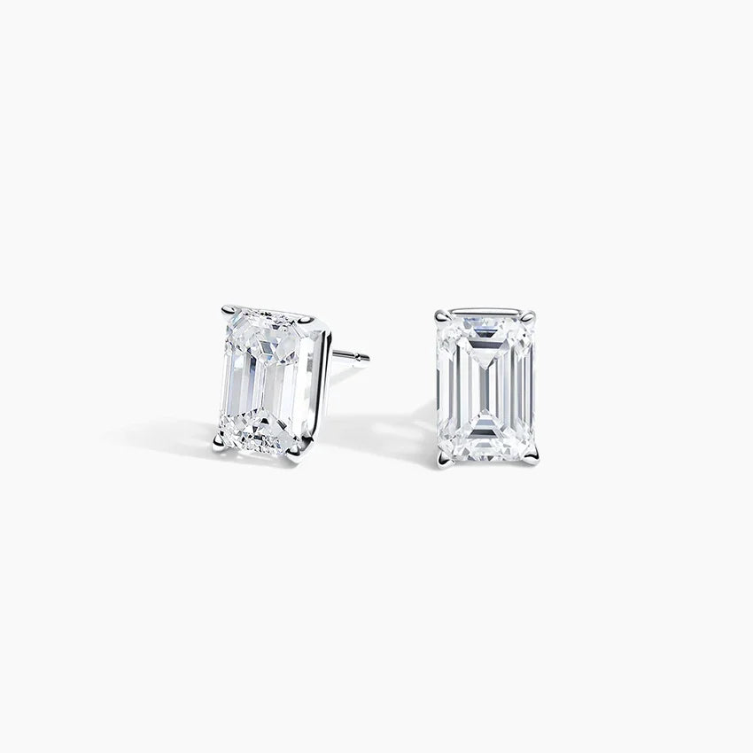 Emerald cut lab diamond stud earrings in 14K white gold from Delux Jewelry on white background