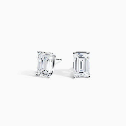 Emerald cut lab diamond stud earrings in 14K white gold from Delux Jewelry on white background