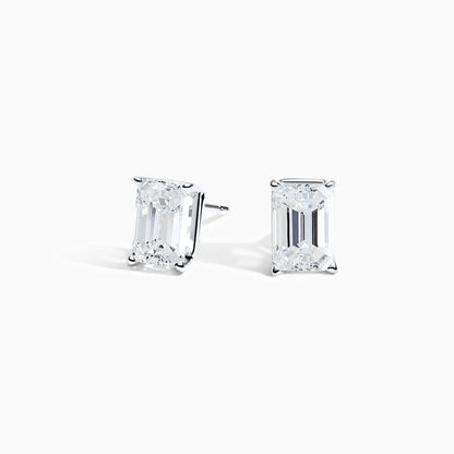 Emerald lab diamond stud earrings in 14K white gold by Delux Jewelry on white background