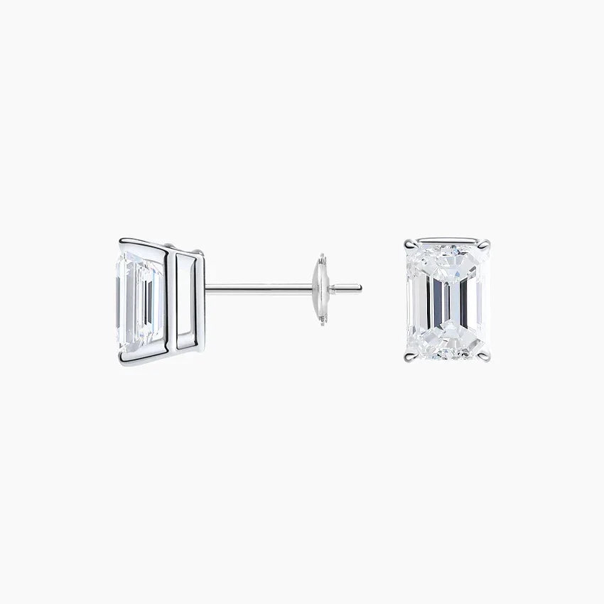 Emerald lab diamond stud earrings in 14K white gold from Delux Jewelry on white background