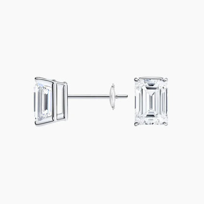 Emerald cut lab diamond stud earrings in 14K white gold from Delux Jewelry on white background