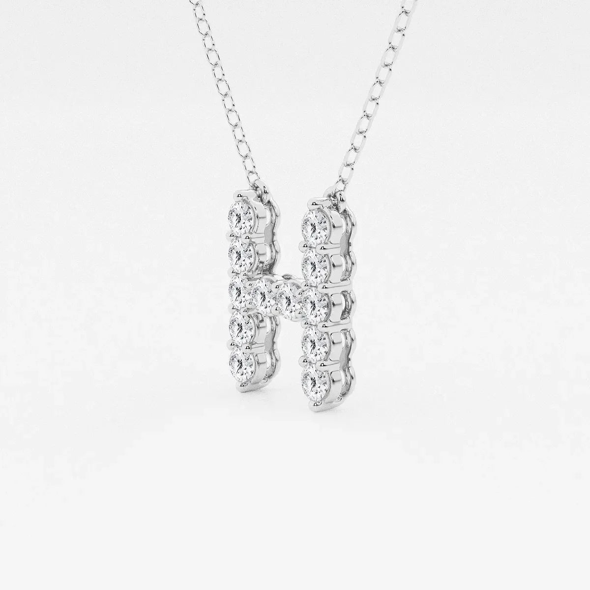 White gold letter H pendant necklace with lab grown diamonds by Delux Jewelry